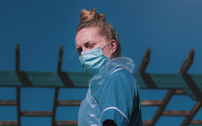 Nurse in COVID-related PPE