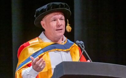 Scott Fletcher MBE receives honorary degree from University of Salford Business School