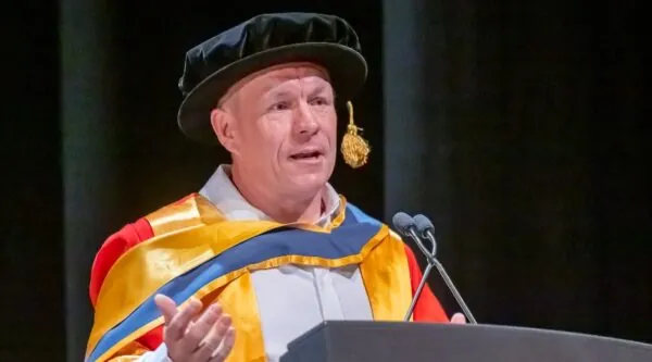 Scott Fletcher MBE receives honorary degree from University of Salford Business School