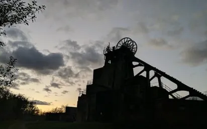 Enginehouse, chimney and headstocks at Pleasley Colliery