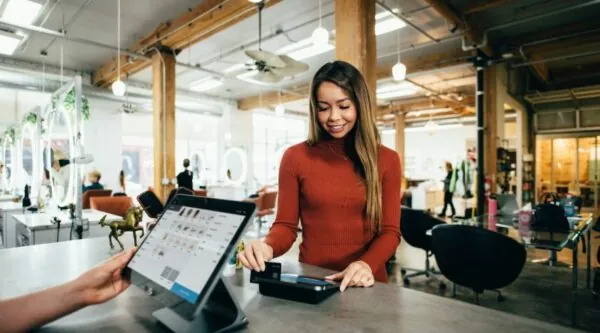 Woman, retail. Credit: Blake Wisz, Unsplash