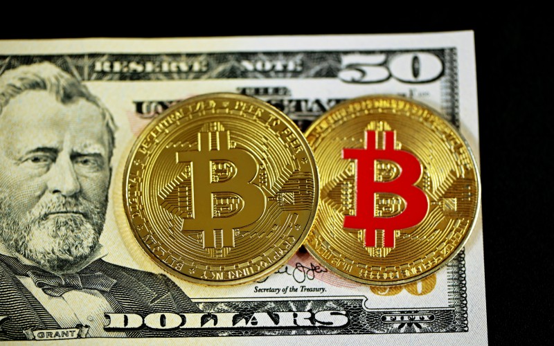 Bitcoin and dollars - credit Kanchanara, Unsplash