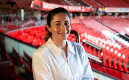 Marie Kelly pictured at Old Trafford Football Ground after winning the University Campus of Football Business Sports Entrepreneur Competition (Credit: UCFB)