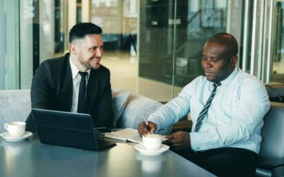 Two men in a meeting. Credit: Vitaly Gariev, Unsplash