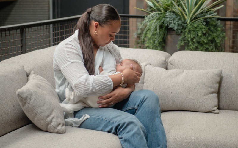 Olivia Davson of Cubbi holding her son