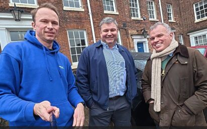 Mark Hewitt, centre, and David Richards MBE, right, of Lexcelerate with Jonathan Symcox of BusinessCloud