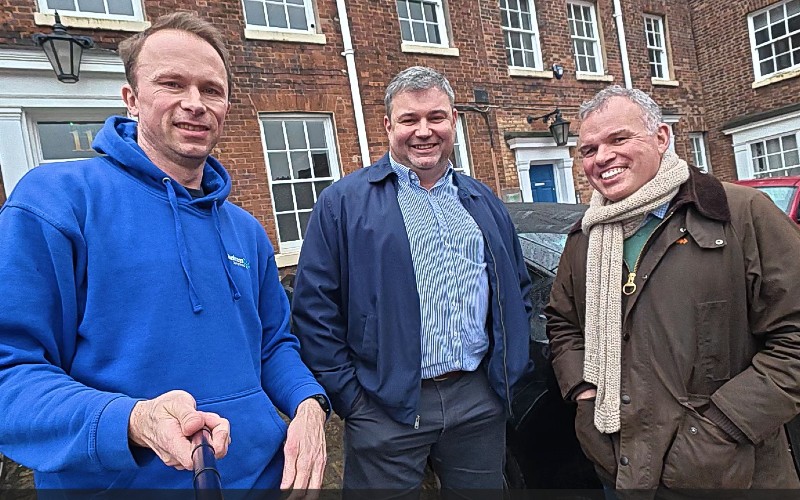 Mark Hewitt, centre, and David Richards MBE, right, of Lexcelerate with Jonathan Symcox of BusinessCloud