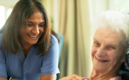 Elderly person with nurse - credit Age Cymru on Unsplash