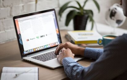 Person using Macbook Pro