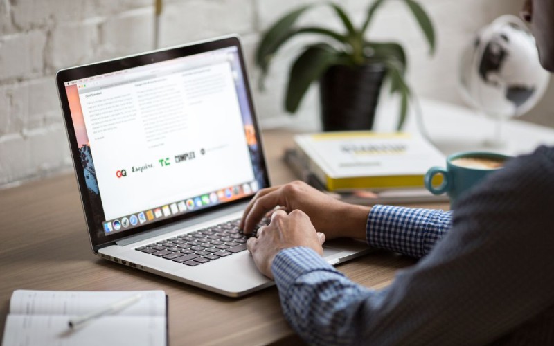 Person using Macbook Pro