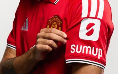 Manchester United shirt featuring SumUp sleeve logo