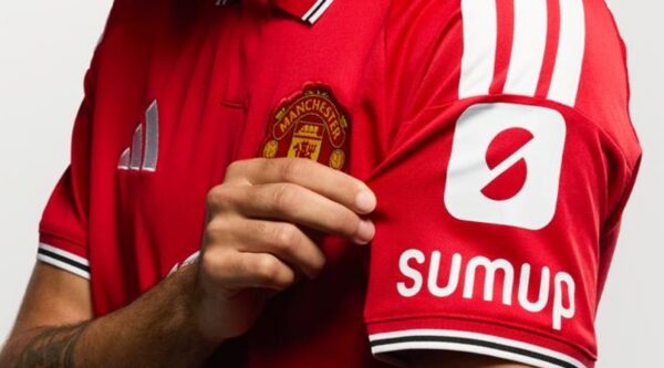 Manchester United shirt featuring SumUp sleeve logo